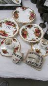 Royal Albert Old Country Roses - pair of candlesticks and three three dishes together with a