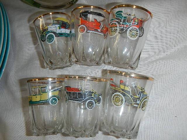 A set of six shot glasses and two others all decorated with vintage cars. - Image 2 of 3