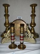 A pair of brass candlesticks, another pair with multicoloured stems and three other brass items.