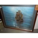 A large framed and glazes seascape print.