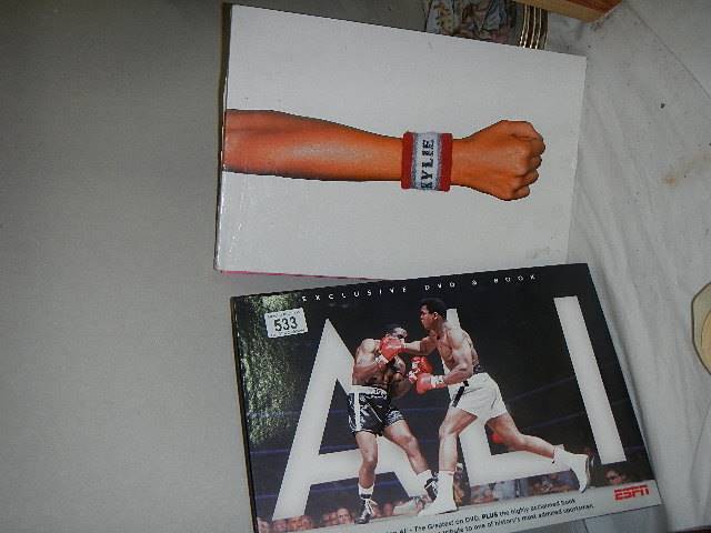 A Mohamed Ali DVD and a Kylie DVD.
