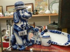 A mixed lot of blue and white including dog decanter.