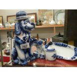 A mixed lot of blue and white including dog decanter.