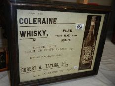 A framed and glazed Coleraine whisky advertisement.