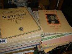 A quantity of music books and sheet music.