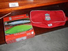 A Liverpool football club bag and jig saw puzzle.