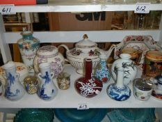 A mixed lot of ceramics including vases, teapot, ginger jar etc.