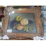 An ornate framed still life by Reekie, frame a/f.