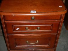 A mahogany bedside chest. (collect only).