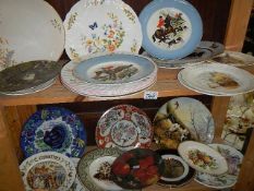 Two shelves of assorted plates.