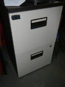 A two drawer filing cabinet. (collect only).