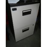 A two drawer filing cabinet. (collect only).