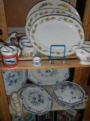 A quantity of meat platters, blue and white plates etc.