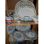 A quantity of meat platters, blue and white plates etc.