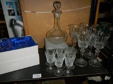 A decanter and glasses.