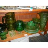 A mixed lot of green glass including jug, vase, dishes etc.