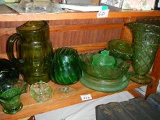 A mixed lot of green glass including jug, vase, dishes etc.