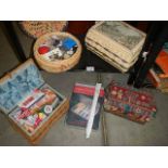 A quantity of sewing baskets and contents.