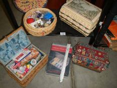 A quantity of sewing baskets and contents.