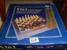 A boxed 5 in 1 multi game set.