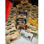 A quantity of boxed die cast trade vehicles.