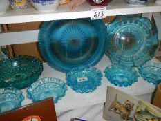 A mixed lot of blue glass bowls.