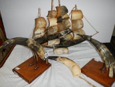 A sailing ship made from horns and three other horns.