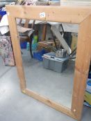 A pine framed mirror, (collect only).