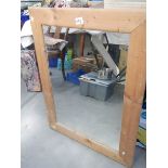 A pine framed mirror, (collect only).