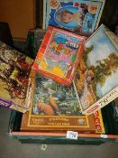 A quantity of jigsaw puzzles.