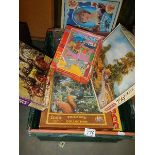 A quantity of jigsaw puzzles.