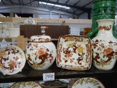 A vase, ginger jar and two bowls.