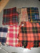 A quantity of picnic blankets.