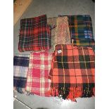 A quantity of picnic blankets.