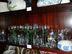 A mixed lot of drinking glasses.