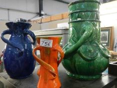Three studio pottery vases.