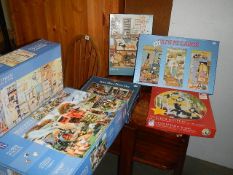 A quantity of jigsaw puzzles.