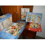 A quantity of jigsaw puzzles.