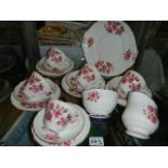 A part Duchess rose decorated tea set,