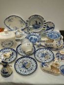 A good lot of blue and white plates, dishes, Ringtons storage jar etc.