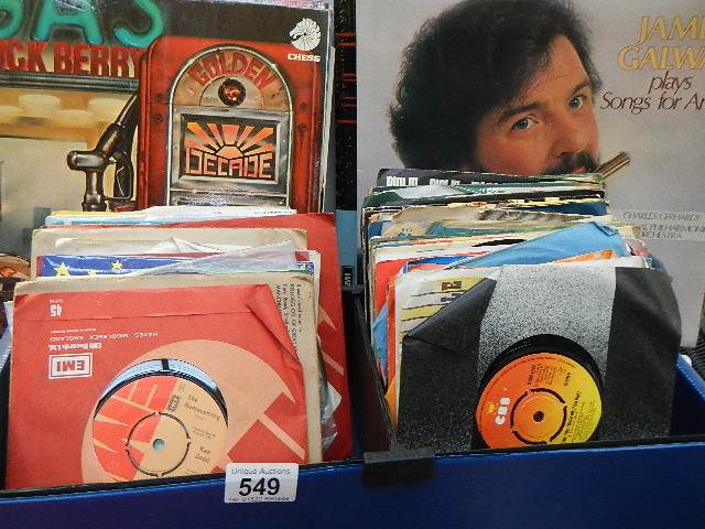 A quantity of LP and 45 rpm records.