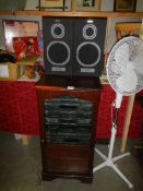 A music centre in cabinet and with speakers. (collect only).