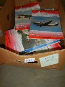 A box of Aviation magazines.