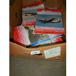 A box of Aviation magazines.