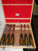 A cased set of six wood chisels.