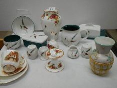 A mixed lot including vases, cheese dish, butter dish, teapot etc.