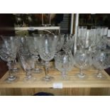 A quantity of drinking glasses including brandy, champagne flutes etc.