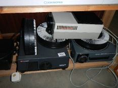 Three slide projectors etc.