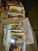 A quantity of assorted postcards.