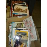 A quantity of assorted postcards.